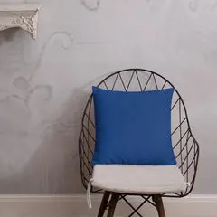 Palm Cockatoo Pillow back on chair by Robyn Cockburn